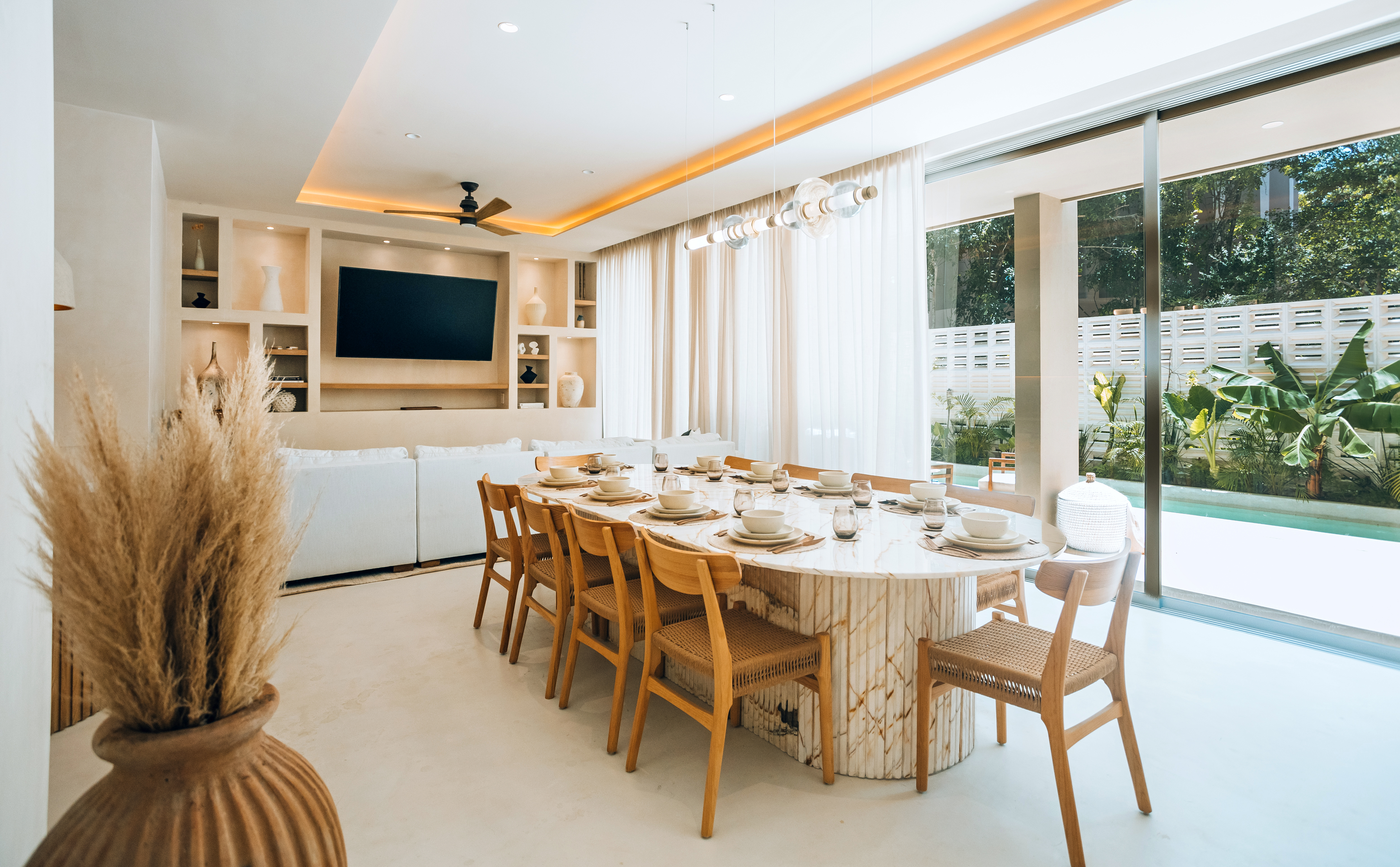 Living and dining area with pool access